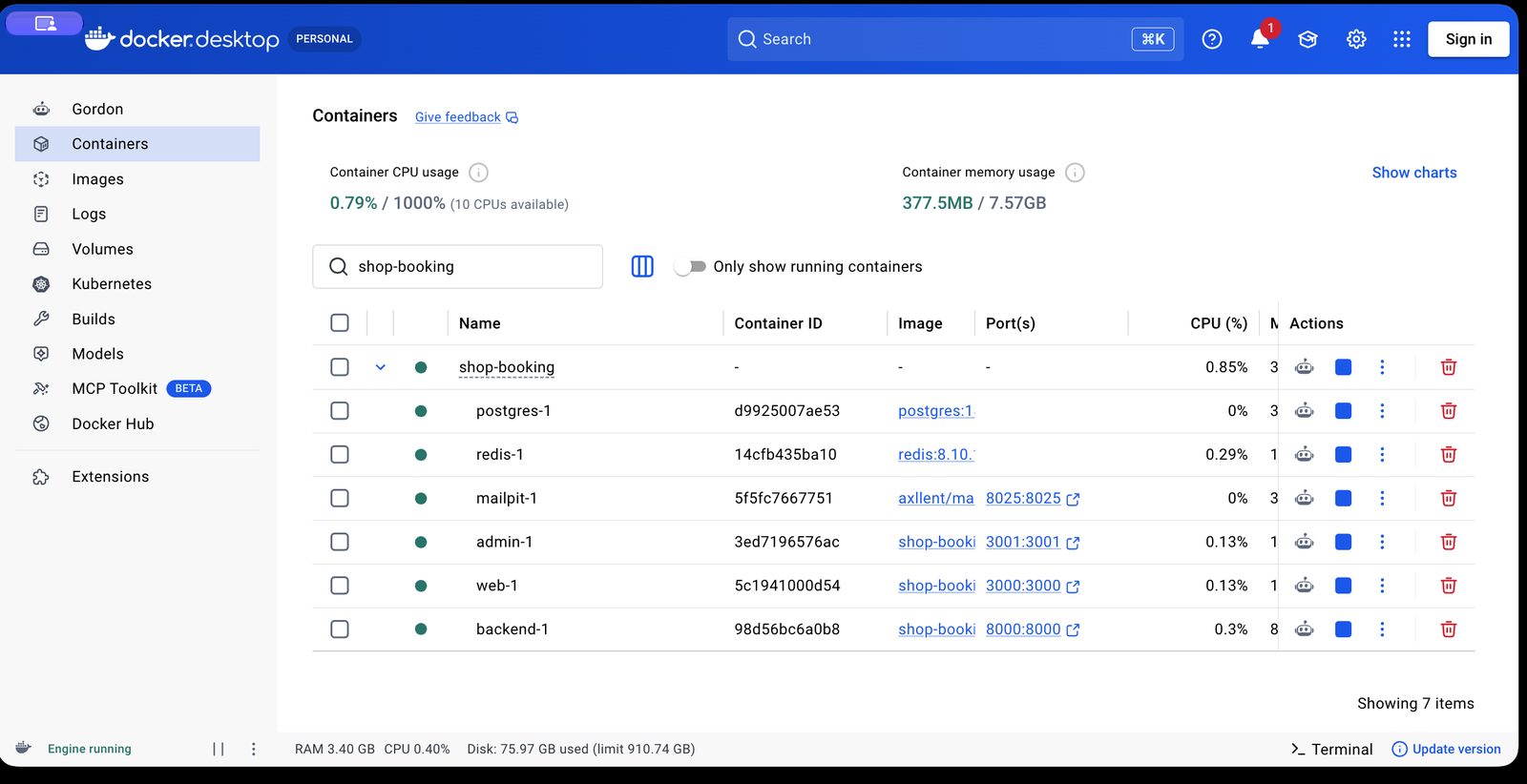 Docker Desktop 顯示執行中(左下角 Engine running);Containers 裡 shop-booking 這一組的服務都是綠燈。